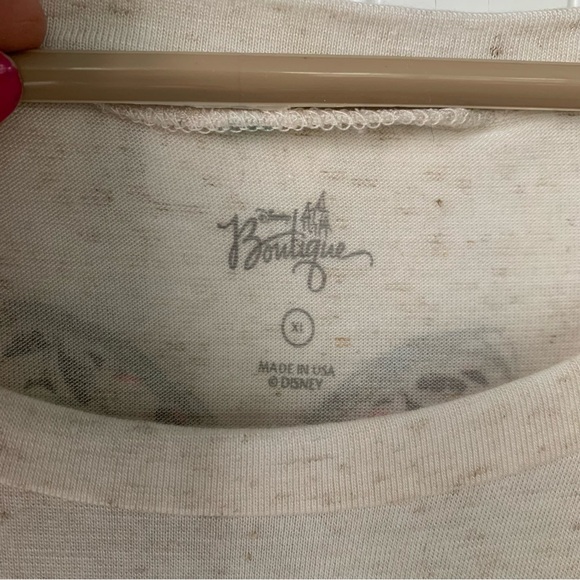 Disney Boutique Minnie Mouse Cream Tee with a Row of of Floral Bows down back - Picture 3 of 9